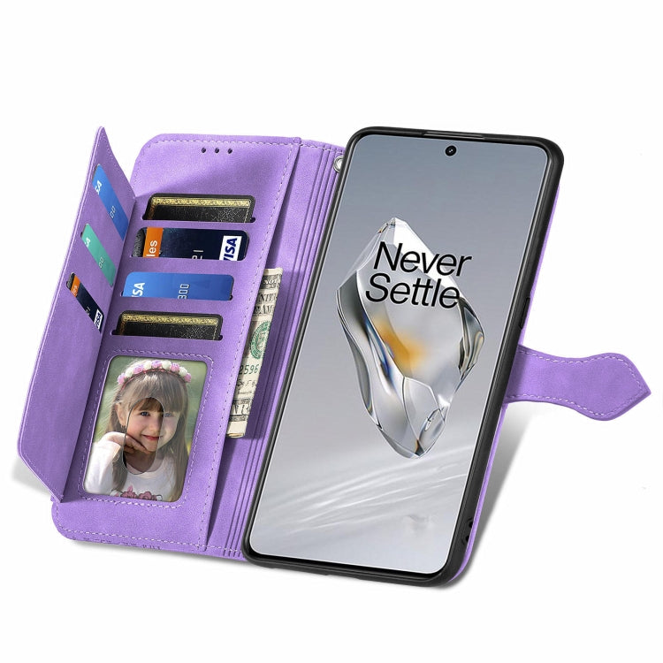 For OnePlus 12 Embossed Flower Zipper Leather Phone Case(Purple) - OnePlus Cases by buy2fix | Online Shopping UK | buy2fix